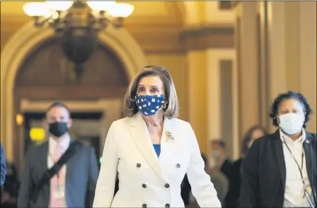  ?? AP PHOTO/ALEX BRANDON ?? House Speaker Nancy Pelosi of Calif., walks from the House floor, during the vote on the Democrat’s $1.9trillion COVID-19relief bill, on Capitol Hill, March 10, in Washington.