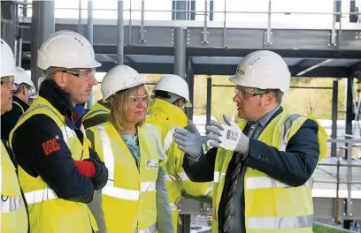  ??  ?? RCT leader Andrew Morgan and Coleg y Cymoedd principal Judith Evans visited the new Aberdare college campus