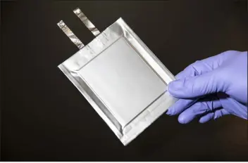  ?? GABRIELA HASBUN — NEW YORK TIMES FILE ?? A solid state lithium metal cell used in electric vehicle batteries, at Quantumsca­pe in San Jose, Calif.