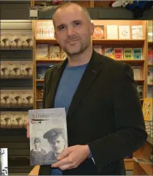  ?? Photo by Fergus Dennehy ?? IT Tralee’s Bob Jackson poses with his ‘A Doctor’s Sword’ book at the Tralee launch in O’ Mahony’s bookstore on Wednesday evening.