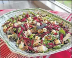  ?? SALLY COLE/THE GUARDIAN ?? The reds and greens vibrate in this colourful recipe: Beet, Apple and Blue Cheese Salad with Honeyed Walnuts.