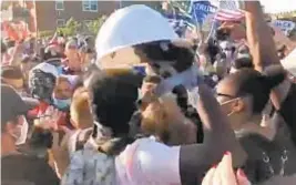  ?? NYPD ?? Police say BLM protester was tased after he hurled a helmet at cops in Bay Ridge, Brooklyn, on Sunday, but tasing occurred blocks from scene in photo.