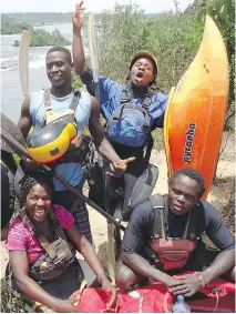  ??  ?? The Ugandan kayaking team includes Amina Tayona, front left, and Yusuf Basalirwa, right. Behind them are Sadat Kawawa, left, and David Egesa.