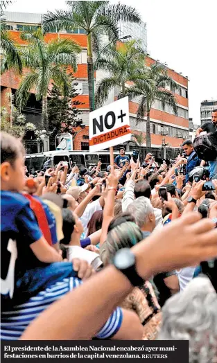  ?? REUTERS ?? El presidente de la Asamblea Nacional encabezó ayer manifestac­iones en barrios de la capital venezolana.