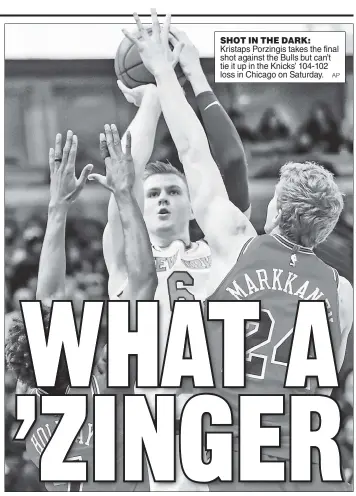  ?? AP ?? SHOT IN THE DARK: Kristaps Porzingis takes the final shot against the Bulls but can’t tie it up in the Knicks’ 104-102 loss in Chicago on Saturday.