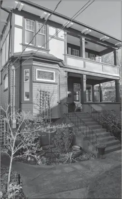  ?? PHOTOS BY FRANCES LITMAN/ TIMES COLONIST ?? A handsome porch and an upper deck give the Victoria home plenty of street appeal. Inside, the touches are equally grand.