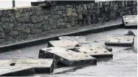  ??  ?? ● Damage to the sea front wall at Criccieth