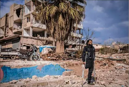  ?? Diego Ibarra Sanchez / New York Times ?? Muhammad Al Halbouni, 31, who lost his leg in a bombing campaign years ago and lost his two daughters during an earthquake earlier this month, is seen in Jindires, Syria, on Feb. 23.