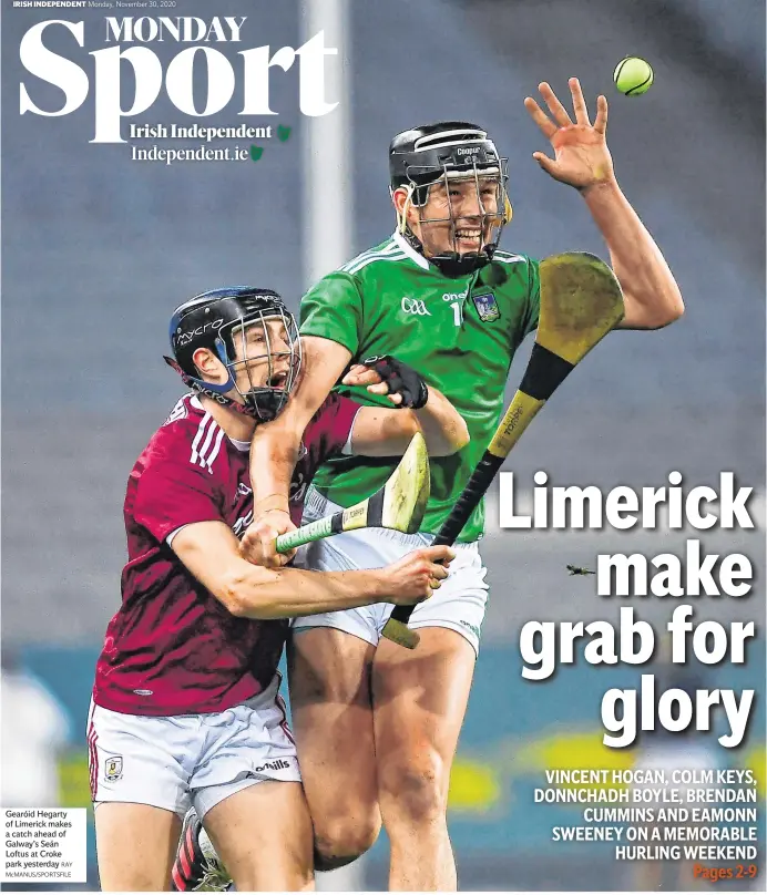  ?? RAY McMANUS/SPORTSFILE ?? Gearóid Hegarty of Limerick makes a catch ahead of Galway’s Seán Loftus at Croke park yesterday
