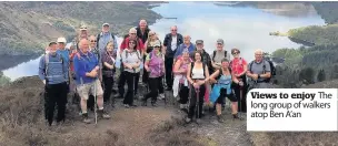  ??  ?? Views to enjoy The long group of walkers atop Ben A’an