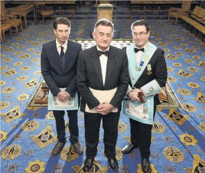  ?? PHOTO: GERARD O’BRIEN ?? Family secrets . . . On the encouragem­ent of his sons Daniel (left) and Jonathan, Chris Laird has recently become a Freemason.