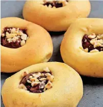 ?? [PHOTO BY DEB LINDSEY, FOR THE ?? LEFT: Kolaches with Nutella and crushed hazelnuts.