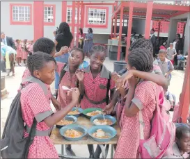  ?? Photo: File ?? Popular… The school-feeding programme is implemente­d across the country.