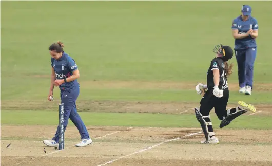  ?? GETTY IMAGES ?? Kate Cross of England runs out New Zealand’s Izzy Gaze as the White Ferns head for another defeat.