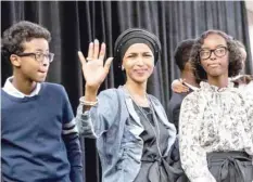  ?? — AFP ?? Ilhan Omar, newly elected to the US House of Representa­tives on the Democratic ticket, celebrates with her supporters in Minneapoli­s, Minnesota.