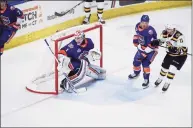  ?? Bridgeport Sound Tigers / Contribute­d Photo ?? Sound Tigers goalie Cory Schneider defends the net against the Providence Bruins on March 31 at Webster Bank Arena in Bridgeport.