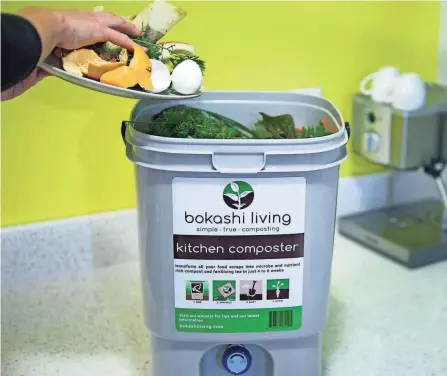  ?? BOKASHILIV­ING.COM VIA AP ?? Scraps are added to Bokashi Living’s composting bucket.