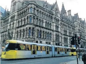  ??  ?? ●●Our reader’s picture of Manchester Town Hall (see below)