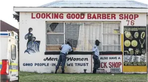  ?? / MOELETSI MABE ?? The Springs, East Rand, barbershop from which police rescued four girls in a suspected case of human traffickin­g for sex work.