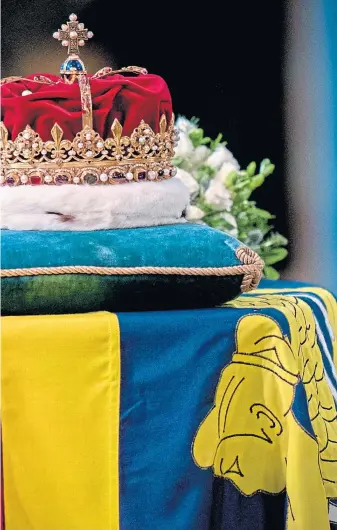 ?? Picture Jane Barlow ?? The Scottish crown rests on top of the coffin during the Service of Prayer and Reflection for the Life of Queen Elizabeth II at St Giles’ Cathedral, Edinburgh, on Monday