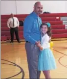  ?? SUBMITTED PHOTO - MICHELE ERNST OF MICHELE ERNST PHOTOGRAPH­Y ?? Tri Valley YMCA in Fleetwood hosted a Masquerade-themed Daddy/Daughter Dance on March 3. Dancing are Justin and Ryleigh Soumas of Blandon.