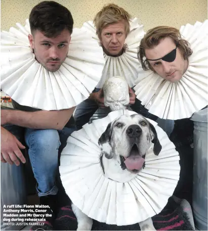  ??  ?? A ruff life: Fionn Walton, Anthony Morris, Conor Madden and Mr Darcy the dog during rehearsals PHOTO: JUSTIN FARRELLY Xxxxx