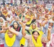  ?? HT PHOTO ?? Farmers have been camping at Delhi borders in protest against the Centre’s three farm laws .