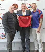  ?? ?? Left: TV and radio personalit­y Eddie McGuire at the recent Warragul Industrial­s Football Netball Club sponsors and life members’ day with long term major sponsor and naming rights sponsor of the football jumpers Andrew Moore of Warragul Toyota (left) and club president Shane Ingham.