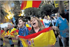  ?? AP/FRANCISCO SECO ?? People protest Wednesday in Barcelona, Spain, against independen­ce for Catalonia.