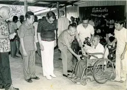  ??  ?? Prasit Lulitanond, late chairman of the Phud Hong Leper Foundation, and committee members visit the colony in Ron Phibun district of Nakhon Si Thammarat to present essential supplies to patients and their dependants.