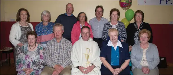  ??  ?? Ballymacel­ligott Parish Committee who presented Fr pat Crean-Lynch with a special gift on Thursday evening at his farewell party in Ballymacel­ligott Community Centre,on Thursday evening