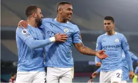  ?? Photograph: Carl Recine/Reuters ?? Manchester City’s Gabriel Jesus (centre) celebrates scoring his first goal of the game against Wolves.