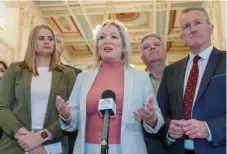  ?? — AFP ?? Northern Ireland’s Deputy First Minister and Irish republican Sinn Fein party Northern Leader Michelle O’neill (C) and her Assembly team emerge from the chamber after the Democratic Unionist Party (DUP) failed to nominate a Speaker, on the Stormont Estate in Belfast.