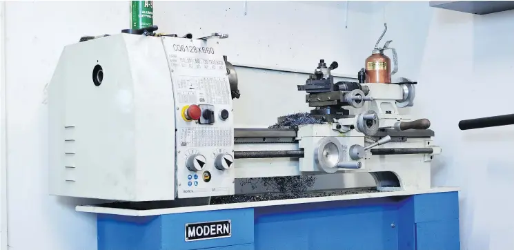  ?? — PAUL MILLER ?? Expert customizer Paul Miller says he couldn’t function in his workshop without his two favourite tools: his Bridgeport mill and this metal lathe from Modern Tool.