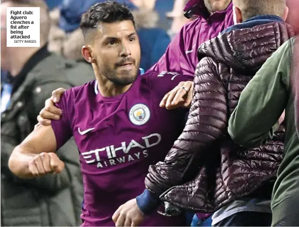  ?? GETTY IMAGES ?? Fight club: Aguero clenches a fist after being attacked