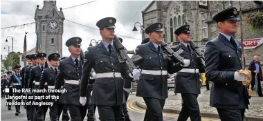  ??  ?? ■ The RAF march through Llangefni as part of the freedom of Anglesey