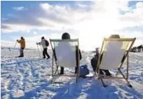  ?? AP ?? Folks in Helsinki chill out on typical winter day. Finland came out on top for fourth year in a row in the World Happiness Report, which also found that despite impact of coronaviru­s, people’s spirits were not crushed for the long haul.