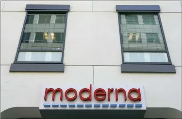  ?? ASSOCIATED PRESS FILE PHOTO ?? A sign for Moderna, Inc. hangs on its headquarte­rs in Cambridge, Mass.