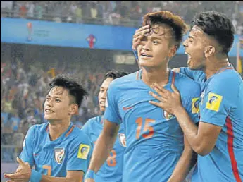  ?? PTI ?? India’s Jeakson Thounaojam (jersey No 15) celebrates with teammates after scoring in their 21 loss to Colombia in New Delhi on Monday.
