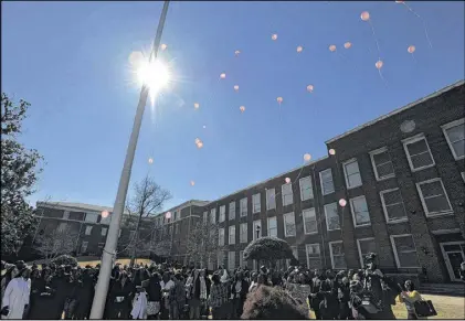  ?? BRANT SANDERLIN PHOTOS / BSANDERLIN@AJC.COM ?? Balloons are released after a memorial for Clark Atlanta University student James Earl Jones Jr. Almost 500 family members, friends and students attended the service for Jones. He was killed Monday after responding to a Craigslist ad for a smartphone.