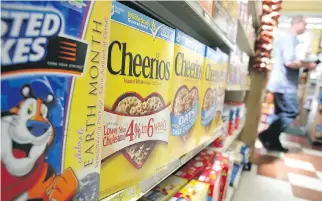  ?? JUSTIN SULLIVAN/GETTY IMAGES ?? While Cheerios may contain three to four per cent sugar, a glance through other ingredient­s indicates it may not be the whole-grain goodness it advertises.