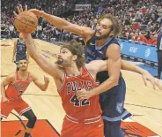  ?? DAVID BANKS/ASSOCIATED PRESS FILE PHOTO ?? Bulls center Robin Lopez, front, and Grizzlies center Joakim Noah battle for the ball Wednesday in Chicago. The NBA All-Star Game, moved from Charlotte, N.C., a few years ago, will be played there this weekend after a controvers­ial state law was partially repealed after several protests.