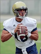  ?? File-DAVID GOLDMAN / The Associated Press ?? Georgia Tech’s Lucas Johnson runs a drill during Spring Practice back in March.