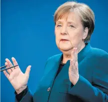  ?? MICHEL KAPPELER/REUTERS – 22/3/2020 ?? Alemanha. Merkel suspendeu o pagamento dos tributos