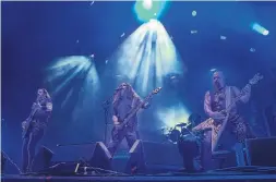  ?? RICK MADONIK PHOTOS/TORONTO STAR ?? Gary Holt, left, Tom Araya and Kerry King wow the crowd at Budweiser Stage.