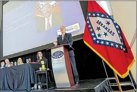  ?? Arkansas Democrat-Gazette/JOHN SYKES JR. ?? Gov. Asa Hutchinson spoke to the Rotary Club of Little Rock on Tuesday at the Clinton Presidenti­al Center on topics including progress on cutting the waiting list for home-based services for people with disabiliti­es.