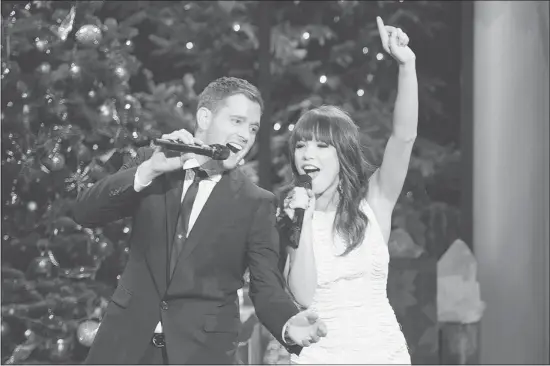 ?? Chris Large/nbc ?? Superstar crooner Michael Buble and Carly Rae Jepsen of Mission, B.C., belt out a melody during the taping of Bublé’s second Christmas TV special.