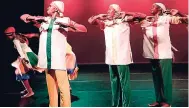  ??  ?? Three male dancers of L’Acadco pose in ‘Bingi,’ choreograp­hed by Dr L’Antoinette Stines.