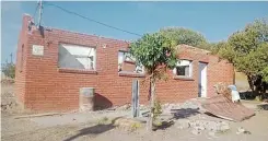  ??  ?? A MOTHER of five and her disabled son have been asked to leave this abandoned municipal building in Witzenberg Municipali­ty in Ceres because it is classed as unfit for human occupation.