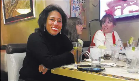  ?? PASHTANA USUFZY LAS VEGAS REVIEW-JOURNAL ?? Cuban Heritage Foundation founder Maria T. Caminero, left, is seen Saturday at the Florida Cafe Cuban Bar & Grill inside The Shalimar Hotel. Caminero’s mother fled Cuba with her and her infant brother in the 1960s. Caminero didn’t see her father, a...